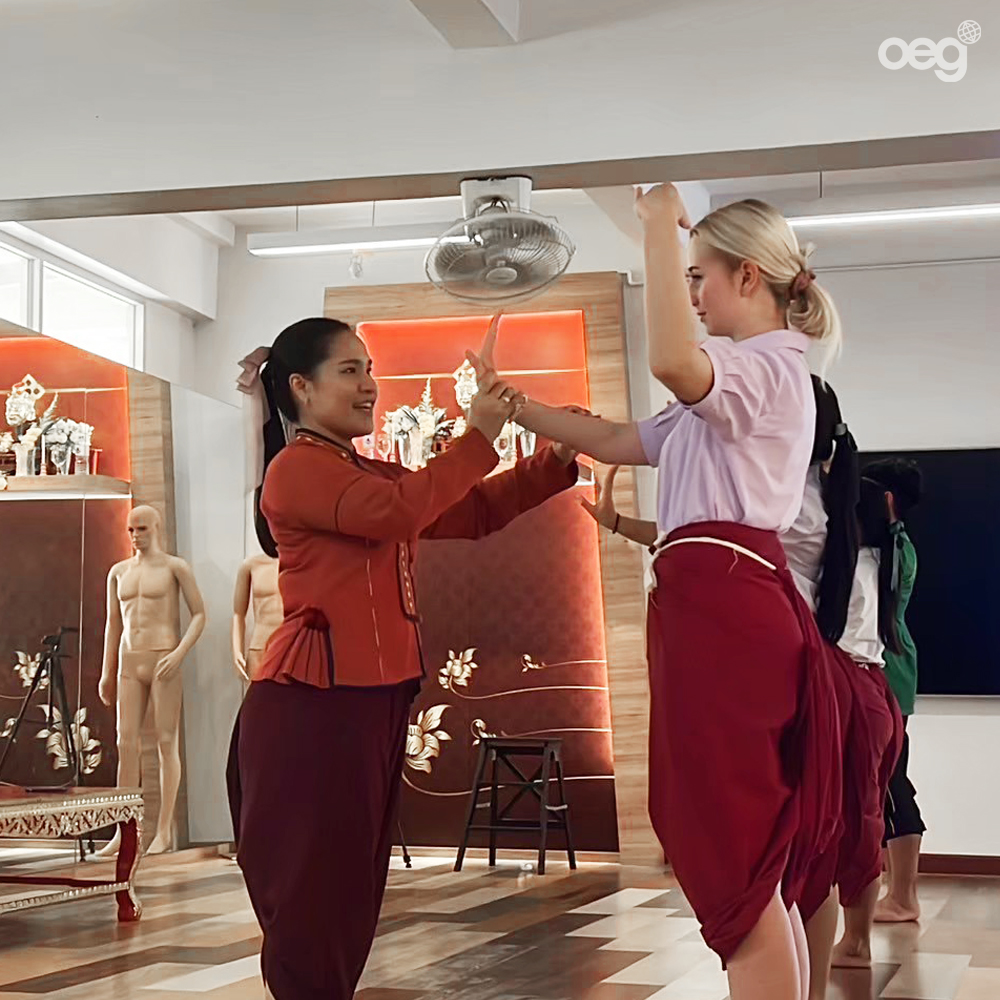 German exchange student immerses herself in Thai culture by learning Thai dance. 